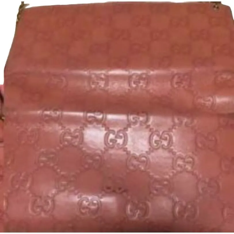 Gucci, salmon colored embossed Guccissima print leather, XL size, wallet on a removable chain