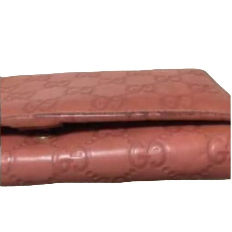 Gucci, salmon colored embossed Guccissima print leather, XL size, wallet on a removable chain