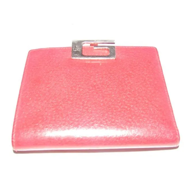 Gucci, true red leather, bi-fold, wallet with a change purse, gold G hinged closure, and lots of interior card slots