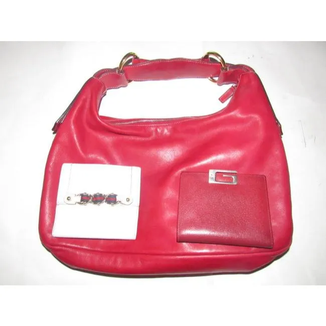 Gucci, true red leather, bi-fold, wallet with a change purse, gold G hinged closure, and lots of interior card slots