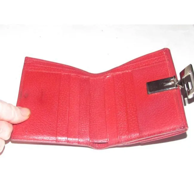 Gucci, true red leather, bi-fold, wallet with a change purse, gold G hinged closure, and lots of interior card slots